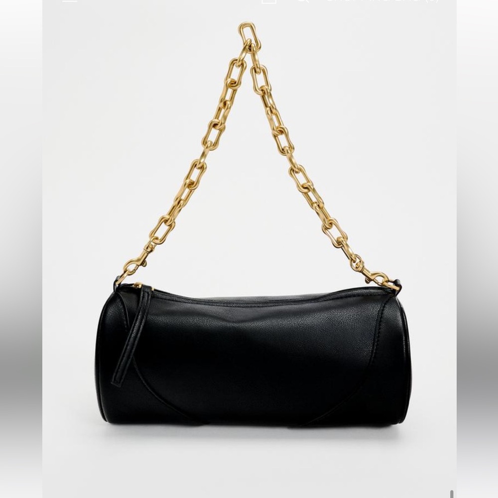 Cylindrical shoulder bag